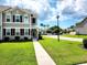 Charming home exterior with manicured lawn, sidewalk, and neutral siding at 516 Papyrus Circle # 516, Little River, SC 29566