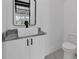 Modern bathroom features a vessel sink, marble countertop, and sleek fixtures at 835 Waterton Ave., Myrtle Beach, SC 29579