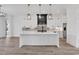 Bright, modern kitchen features a large island with marble countertop and stainless steel appliances at 835 Waterton Ave., Myrtle Beach, SC 29579