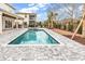 Inviting pool area with beautiful stone pavers and a spa, perfect for relaxation and entertaining at 835 Waterton Ave., Myrtle Beach, SC 29579