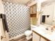 Neutral bathroom featuring a shower/tub combo with updated vanity and fixtures at 9550 Dunes Gable Dr. # F, Myrtle Beach, SC 29572