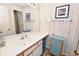 Classic bathroom featuring a white sink, and wallpaper at 9550 Dunes Gable Dr. # F, Myrtle Beach, SC 29572