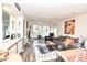 Bright living room featuring wood floors, sliding glass door, and contemporary artwork at 9550 Dunes Gable Dr. # F, Myrtle Beach, SC 29572