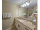 Bathroom vanity and mirror and granite counters and modern fixtures at 9994 Beach Club Dr. # 205, Myrtle Beach, SC 29572