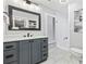 Modern bathroom with gray vanity, white subway tile shower at 11 Valencia Circle, Myrtle Beach, SC 29572