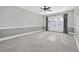 Bedroom with French doors and ceiling fan at 11 Valencia Circle, Myrtle Beach, SC 29572