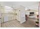 Kitchen with white cabinets and stainless steel appliances at 11 Valencia Circle, Myrtle Beach, SC 29572