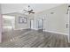 Spacious living room with hardwood floors and ceiling fan at 11 Valencia Circle, Myrtle Beach, SC 29572