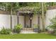 Charming pergola covered in vines, creating a serene outdoor space at 11 Valencia Circle, Myrtle Beach, SC 29572