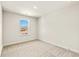 Bright bedroom with carpeted floor and a window at 241 Bent Green Ct. # 64A, Murrells Inlet, SC 29576