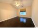 Bedroom with ceiling fan and window, featuring hardwood floors at 2549 Sugar Creek Ct., Myrtle Beach, SC 29579