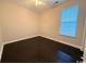 Bedroom featuring ceiling fan, natural light, and dark wood-look flooring at 2549 Sugar Creek Ct., Myrtle Beach, SC 29579