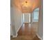 Inviting foyer with tile flooring, transom windows, and a view into the adjacent room at 2549 Sugar Creek Ct., Myrtle Beach, SC 29579