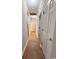 Hallway with wood-look floors leads to various rooms at 2549 Sugar Creek Ct., Myrtle Beach, SC 29579