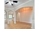 Open-concept living area featuring hardwood floors, archways, and bright, neutral paint at 2549 Sugar Creek Ct., Myrtle Beach, SC 29579