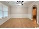 Bright and airy living room with ceiling fan, modern trim, and views to other rooms at 2549 Sugar Creek Ct., Myrtle Beach, SC 29579