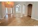 Open floorplan with archways that leads into the front door and dining room areas at 2549 Sugar Creek Ct., Myrtle Beach, SC 29579