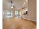 Expansive living space with wood floors, open layout, and seamless flow to the kitchen at 2549 Sugar Creek Ct., Myrtle Beach, SC 29579