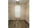 Walk-in closet features custom shelving and wood-look floors at 2549 Sugar Creek Ct., Myrtle Beach, SC 29579