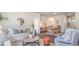 Open-concept living area featuring stylish decor and a seamless flow into the dining space at 318 Cheerful Way, Little River, SC 29566
