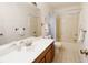 Clean bathroom with tub/shower and updated vanity at 466 Spauldingwood Rd., Little River, SC 29566