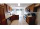 Kitchen with stainless steel appliances and wood cabinets at 466 Spauldingwood Rd., Little River, SC 29566