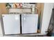 Stackable washer and dryer in a well-lit laundry room at 466 Spauldingwood Rd., Little River, SC 29566