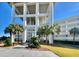 Oceanfront building with palm trees and a walkway at 9840 Queensway Blvd. # 330, Myrtle Beach, SC 29572