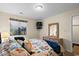 Bedroom with a queen-sized bed, a mounted television, and a dresser at 1930 Bent Grass Dr. # 40K, Surfside Beach, SC 29575