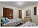 Guest bedroom featuring twin beds and closet for convenient storage at 1930 Bent Grass Dr. # 40K, Surfside Beach, SC 29575