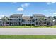 Condominium complex featuring multiple units with private balconies and well-kept landscaping at 1930 Bent Grass Dr. # 40K, Surfside Beach, SC 29575