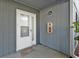 Welcoming front door with storm door, 