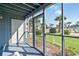 A lovely sunroom offers views of the community lawn and pool, perfect for unwinding at 1930 Bent Grass Dr. # 40K, Surfside Beach, SC 29575