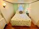 Comfortable bedroom with a twin bed, green accents, and ample natural light at 6001 - 5410 S Kings Hwy., Myrtle Beach, SC 29575