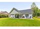 Gray house exterior with covered patio and landscaped yard at 790 Caines Landing Rd., Conway, SC 29526