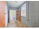 Unfinished basement with concrete floor and shelving unit at 1861 Jenerette St., Mullins, SC 29574