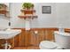 Simple bathroom with wood-paneled walls and a pedestal sink at 1861 Jenerette St., Mullins, SC 29574