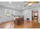 Charming dining area with wood floors and a farmhouse table at 1861 Jenerette St., Mullins, SC 29574