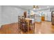 Dining area with wood floors and kitchen view at 1861 Jenerette St., Mullins, SC 29574