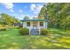 Small cottage with green trim and front porch at 1861 Jenerette St., Mullins, SC 29574