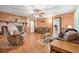 Living room with brick fireplace and comfortable seating at 1861 Jenerette St., Mullins, SC 29574