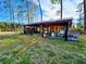 Rustic wooden shed with open sides at 1861 Jenerette St., Mullins, SC 29574