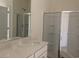 Modern bathroom featuring a glass-enclosed shower, and a quartz countertop on the vanity at 1060 Log Cabin Rd., Loris, SC 29569