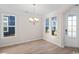 Dining room with hardwood floors and access to kitchen at 284 Starlit Way, Myrtle Beach, SC 29579