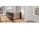 Kitchen island with white countertop and dark cabinetry at 284 Starlit Way, Myrtle Beach, SC 29579