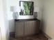 Charming nook features display cabinet with decor and matching lamps at 7100 N Ocean Blvd. # 1023, Myrtle Beach, SC 29572