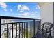 Private balcony with chairs and a table, featuring an ocean view at 7100 Ocean Blvd. N # 1425, Myrtle Beach, SC 29572