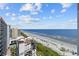 Stunning ocean view from a high-floor condo, showing beach and hotels at 7100 Ocean Blvd. N # 1425, Myrtle Beach, SC 29572