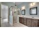 This primary bathroom boasts double sink vanity and a glass-enclosed shower at 1348 Peterson St., Myrtle Beach, SC 29577