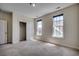 Bedroom with two large windows and an open closet, providing ample natural light at 1348 Peterson St., Myrtle Beach, SC 29577
